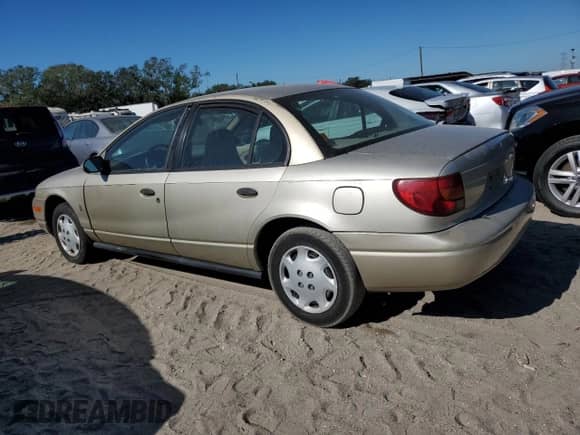 2000 Saturn SL with VIN 1G8ZG5287YZ224435, listed as a Copart auction lot 80536924 with 239,354 mi miles and Salvage title. Bid and sale history available at DreamBid. Image 2.
