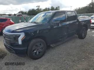 2023 Ford F-150 Lightning XLT with VIN 1FT6W1EV7PWG54861, listed as a Copart auction lot 81901995 with 35,607 mi miles and Salvage title. Bid and sale history available at DreamBid. Image 1.