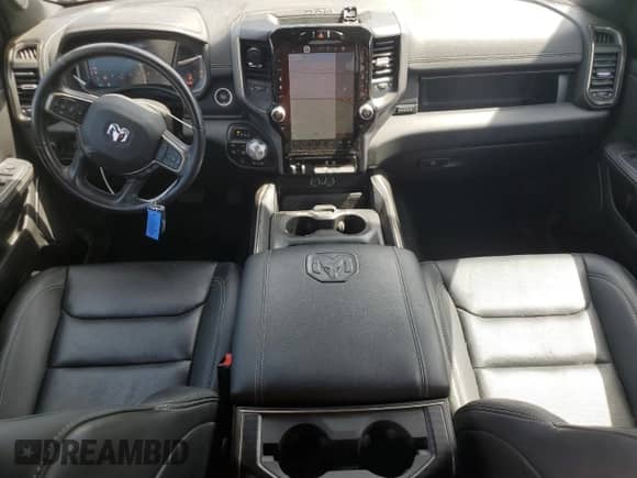 2023 Ram 1500 Rebel z VIN 1C6SRFLT0PN628832, wystawiony jako Copart lot #61938475 z przebiegiem 43 293 mil mil oraz Szkoda całkowita • Salvage title. Historia ofert i sprzedaży dostępna na DreamBid. Obrazek 8.