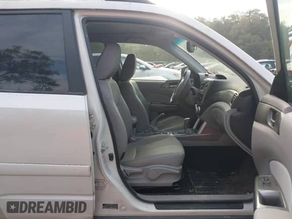 2012 Subaru Forester X Limited z VIN JF2SHBEC9CH440905, wystawiony jako IAAI lot #43238587 z przebiegiem 190 878 mil mil oraz . Historia ofert i sprzedaży dostępna na DreamBid. Obrazek 5.