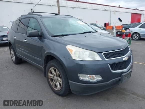 2009 Chevrolet Traverse LS z VIN 1GNEV13D59S142011, wystawiony jako IAAI lot #42514632 z przebiegiem 163 103 mil mil oraz . Historia ofert i sprzedaży dostępna na DreamBid. Obrazek 1.