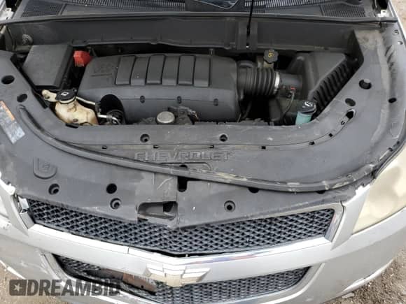 2012 Chevrolet Traverse 1LT z VIN 1GNKVGED2CJ198245, wystawiony jako Copart lot #69516755 z przebiegiem 199 077 mil mil oraz Szkoda całkowita • Salvage title. Historia ofert i sprzedaży dostępna na DreamBid. Obrazek 11.