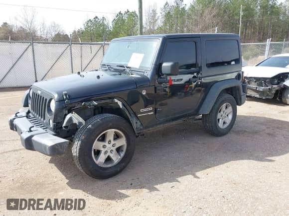 2018 Jeep Wrangler Sport with VIN 1C4AJWAG6JL856998, listed as a IAAI auction lot 41785595 with 179,310 mi miles and . Bid and sale history available at DreamBid. Image 2.