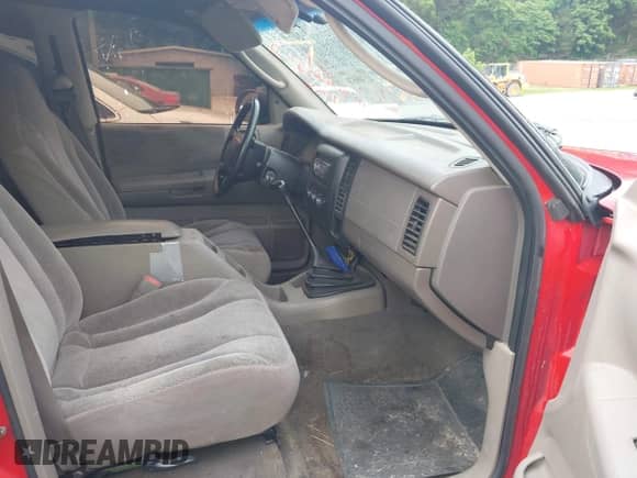 2003 Dodge Dakota Sport z VIN 1D7HG38X03S333959, wystawiony jako IAAI lot #42306578 z przebiegiem 298 949 mil mil oraz . Historia ofert i sprzedaży dostępna na DreamBid. Obrazek 5.