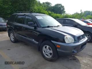 2002 Hyundai Santa Fe z VIN KM8SB12B72U276819, wystawiony jako IAAI lot #42483049 z przebiegiem 140 565 mil mil oraz . Historia ofert i sprzedaży dostępna na DreamBid. Obrazek 1.