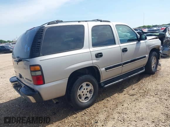 2005 Chevrolet Tahoe LT z VIN 1GNEC13T25J147583, wystawiony jako IAAI lot #42275971 z przebiegiem 244 307 mil mil oraz . Historia ofert i sprzedaży dostępna na DreamBid. Obrazek 4.