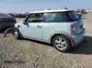 2011 MINI Hardtop with VIN WMWSU3C52BT253034, listed as a Copart auction lot 90109305 with 50,636 mi miles and Salvage title. Bid and sale history available at DreamBid. Image 2.