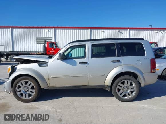 2010 Dodge Nitro Heat with VIN 1D4PU4GK4AW157565, listed as a IAAI auction lot 41851400 with 209,535 mi miles and . Bid and sale history available at DreamBid. Image 14.