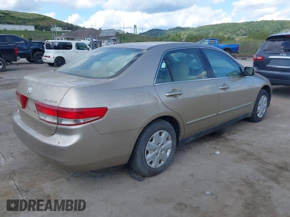 2003 Honda Accord LX with VIN 1HGCM55323A136731, listed as a IAAI auction lot 43095471 with 230,749 mi miles and . Bid and sale history available at DreamBid. Image 4.