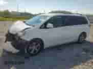 2014 Toyota Sienna LE AAS with VIN 5TDKK3DC5ES480016, listed as a Copart auction lot 70772115 with 164,920 mi miles and Salvage title. Bid and sale history available at DreamBid. Image 1.