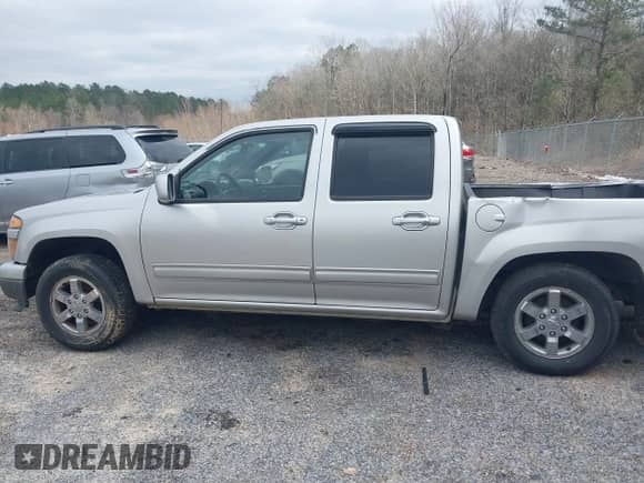 2010 Chevrolet Colorado 1LT z VIN 1GCDSCDE7A8143405, wystawiony jako IAAI lot #41578223 z przebiegiem 158 886 mil mil oraz . Historia ofert i sprzedaży dostępna na DreamBid. Obrazek 14.