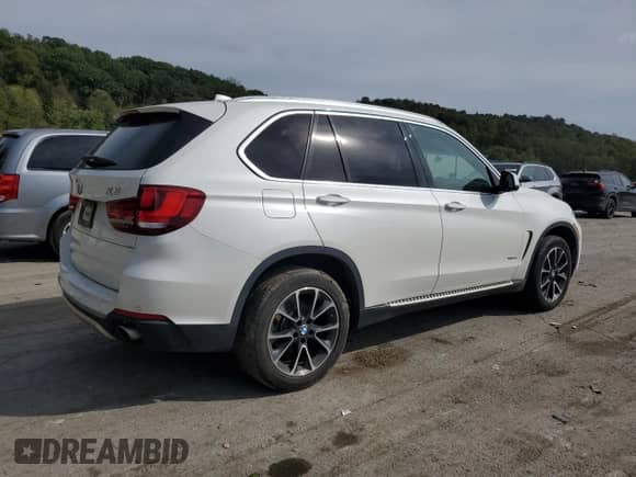 2017 BMW X5 xDrive35i with VIN 5UXKR0C5XH0U50500, listed as a Copart auction lot 84577295 with 105,740 mi miles and Salvage title. Bid and sale history available at DreamBid. Image 3.