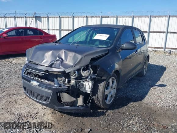 2013 Chevrolet Sonic LTZ with VIN 1G1JE6SH9D4100004, listed as a IAAI auction lot 41501606 with 122,973 mi miles and . Bid and sale history available at DreamBid. Image 6.