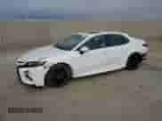 2023 Toyota Camry Hybrid SE with VIN 4T1S31AK0PU046562, listed as a Copart auction lot 69478395 with 84,935 mi miles and Salvage title. Bid and sale history available at DreamBid. Image 1.