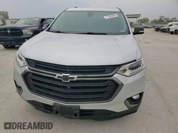 2018 Chevrolet Traverse Premier z VIN 1GNERKKW9JJ100786, wystawiony jako Copart lot #71393895 z przebiegiem 162 859 mil mil oraz Szkoda całkowita • Salvage title. Historia ofert i sprzedaży dostępna na DreamBid. Obrazek 13.