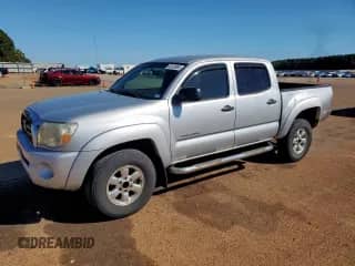 2005 Toyota Tacoma PreRunner with VIN 5TEJU62N15Z044259, listed as a Copart auction lot 82426985 with 152,493 mi miles and Salvage title. Bid and sale history available at DreamBid. Image 1.