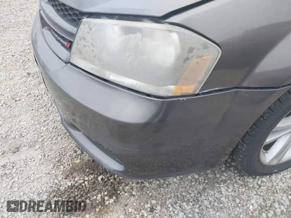 2014 Dodge Avenger SXT with VIN 1C3CDZCB9EN227897, listed as a IAAI auction lot 43561287 with 26,401 mi miles and . Bid and sale history available at DreamBid. Image 12.