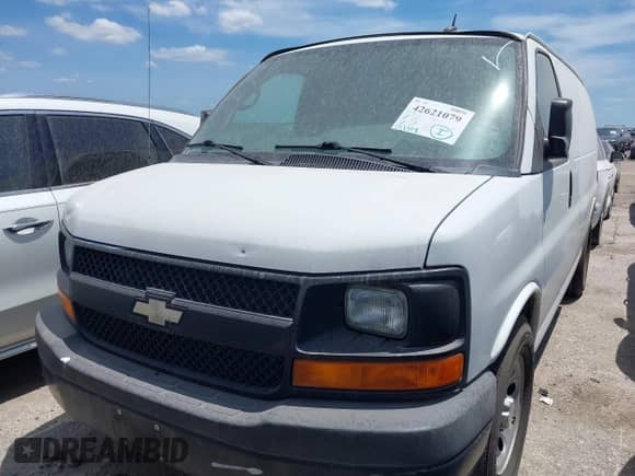 2014 Chevrolet Express Cargo with VIN 1GCSGAFX3E1163645, listed as a IAAI auction lot 42621079 with 251,814 mi miles and . Bid and sale history available at DreamBid. Image 2.