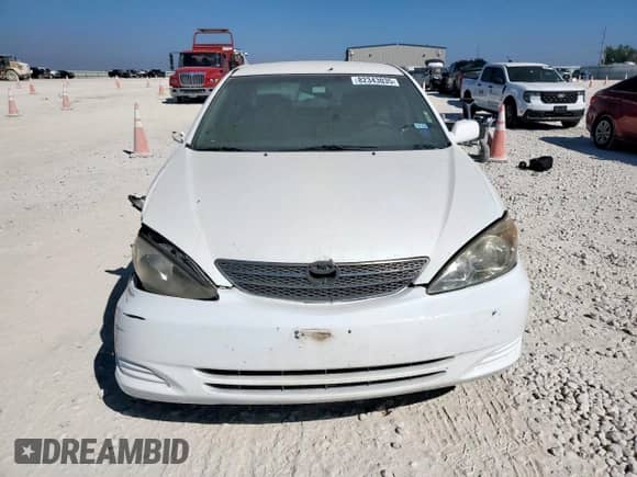 2002 Toyota Camry XLE с VIN 4T1BE30K12U010878, выставлен на аукционе Copart как лот 82343035 с пробегом 206 937 миль миль и Списание • Salvage title. История ставок и продаж доступна на DreamBid. Изображение 5.