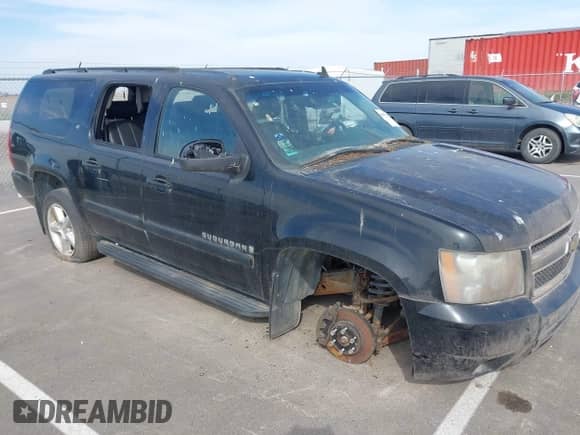 2008 Chevrolet Suburban LTZ z VIN 3GNFK163X8G199732, wystawiony jako IAAI lot #41930128 z przebiegiem 174 767 mil mil oraz . Historia ofert i sprzedaży dostępna na DreamBid. Obrazek 11.