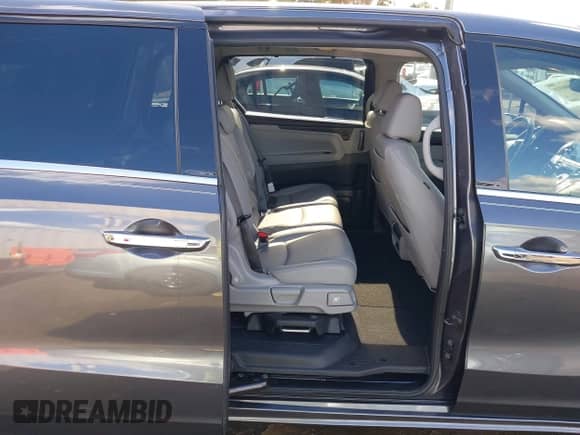 2018 Honda Odyssey Elite z VIN 5FNRL6H91JB071957, wystawiony jako IAAI lot #43506915 z przebiegiem 75 656 mil mil oraz . Historia ofert i sprzedaży dostępna na DreamBid. Obrazek 8.