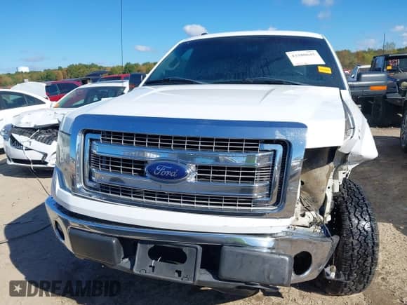 2014 Ford F-150 FX4 z VIN 1FTFW1EF0EKF51147, wystawiony jako IAAI lot #43380645 z przebiegiem 278 946 mil mil oraz . Historia ofert i sprzedaży dostępna na DreamBid. Obrazek 12.