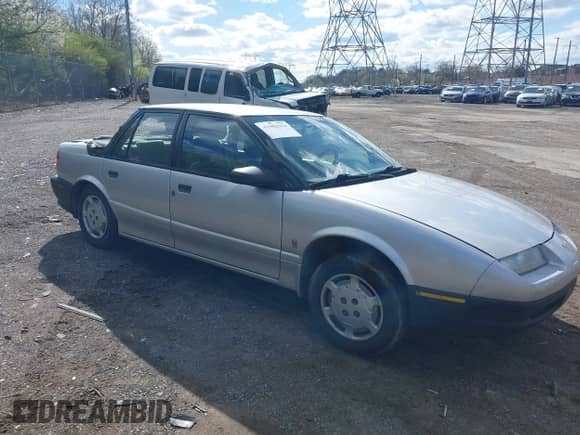 1992 Saturn SL with VIN 1G8ZG5491NZ263345, listed as a IAAI auction lot 41982914 with 116,545 mi miles and . Bid and sale history available at DreamBid. Image 1.