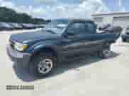 1998 Toyota Tacoma z VIN 4TASM92N7WZ121828, wystawiony jako Copart lot #64122235 z przebiegiem 200 637 mil mil oraz Szkoda całkowita • Salvage title. Historia ofert i sprzedaży dostępna na DreamBid. Obrazek 1.
