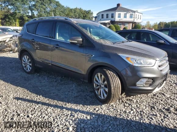 2017 Ford Escape Titanium с VIN 1FMCU9JD5HUA56393, выставлен на аукционе Copart как лот 82234335 с пробегом 121 190 миль миль и Чистый • Clean title. История ставок и продаж доступна на DreamBid. Изображение 4.