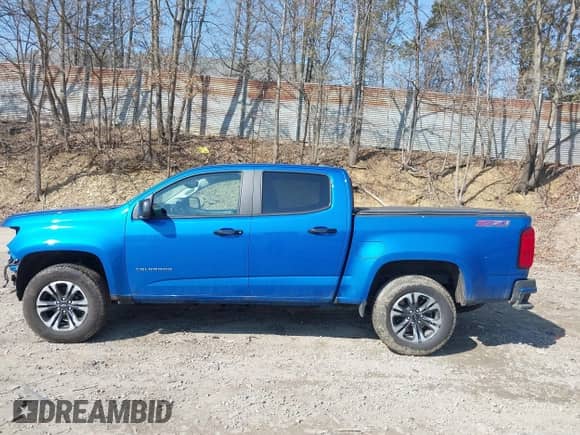 2021 Chevrolet Colorado 4WD Z71 z VIN 1GCGTDEN7M1280209, wystawiony jako IAAI lot #41779245 z przebiegiem 48 094 mil mil oraz . Historia ofert i sprzedaży dostępna na DreamBid. Obrazek 15.