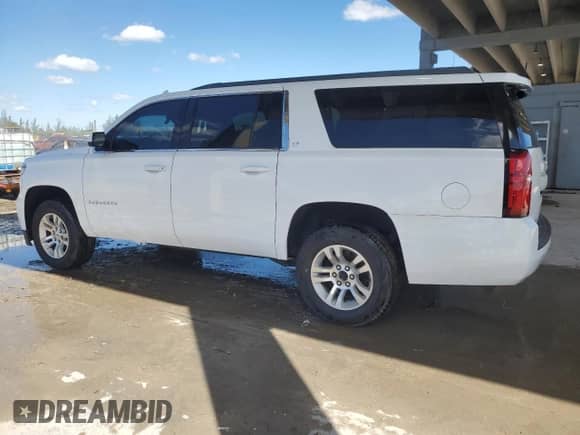 2015 Chevrolet Suburban LT with VIN 1GNSCJKC5FR543501, listed as a Copart auction lot 86239365 with 218,893 mi miles and Clean title. Bid and sale history available at DreamBid. Image 2.