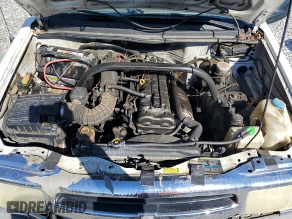 2003 Chevrolet Tracker z VIN 2CNBE13C736912038, wystawiony jako Copart lot #80422844 z przebiegiem 242 512 mil mil oraz Szkoda całkowita • Salvage title. Historia ofert i sprzedaży dostępna na DreamBid. Obrazek 12.