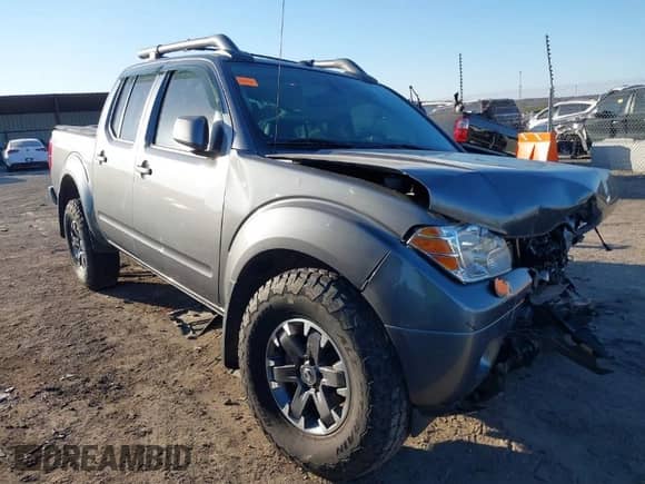 2020 Nissan Frontier Pro-4X with VIN 1N6ED0EB1LN708265, listed as a IAAI auction lot 41398914 with 98,665 mi miles and . Bid and sale history available at DreamBid. Image 1.