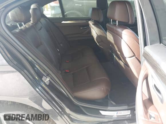 2014 BMW 5 Series 535d with VIN WBAXA5C50ED001937, listed as a IAAI auction lot 42750664 with 99,827 mi miles and . Bid and sale history available at DreamBid. Image 8.