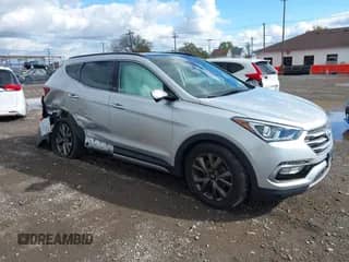 2018 Hyundai Santa Fe Ultimate z VIN 5XYZWDLA7JG530737, wystawiony jako IAAI lot #43428713 z przebiegiem 58 759 mil mil oraz . Historia ofert i sprzedaży dostępna na DreamBid. Obrazek 1.