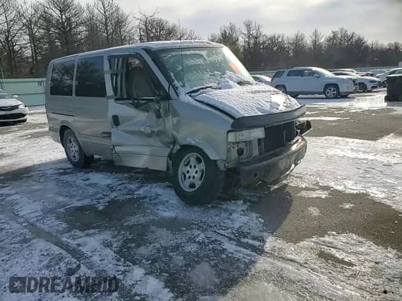 2005 Chevrolet Astro z VIN 1GNDM19X55B128751, wystawiony jako Copart lot #88860595 z przebiegiem Nie podano mil oraz Szkoda całkowita • Salvage title. Historia ofert i sprzedaży dostępna na DreamBid. Obrazek 11.