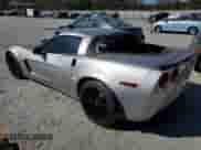 2006 Chevrolet Corvette Z06 z VIN 1G1YY26E565126935, wystawiony jako Copart lot #76618494 z przebiegiem 71 842 mil mil oraz Szkoda całkowita • Salvage title. Historia ofert i sprzedaży dostępna na DreamBid. Obrazek 2.