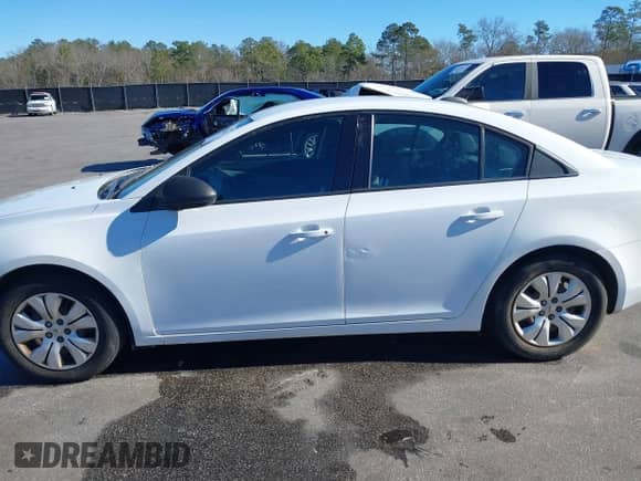 2015 Chevrolet Cruze LS with VIN 1G1PB5SH2F7291005, listed as a IAAI auction lot 41262811 with 112,153 mi miles and . Bid and sale history available at DreamBid. Image 13.