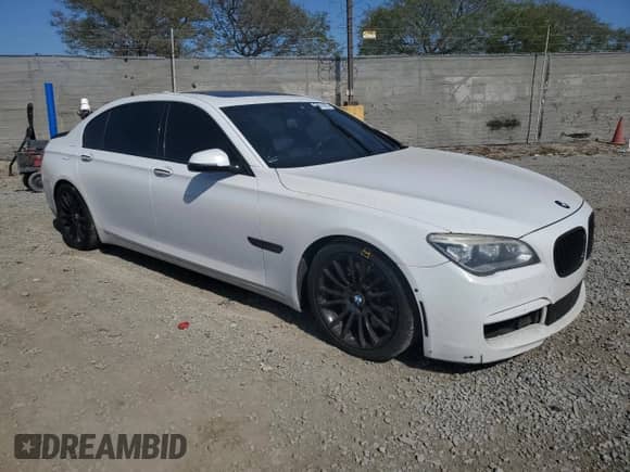2014 BMW 7 Series ALPINA B7 with VIN WBAYE8C5XED135705, listed as a Copart auction lot 54414925 with 126,586 mi miles and Salvage title. Bid and sale history available at DreamBid. Image 4.