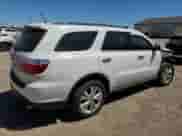 2013 Dodge Durango Crew with VIN 1C4SDJDT8DC697137, listed as a Copart auction lot 64930825 with 137,680 mi miles and Clean title. Bid and sale history available at DreamBid. Image 3.