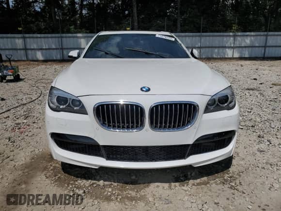 2013 BMW 7 Series 740Li xDrive с VIN WBAYF4C56DD127668, выставлен на аукционе Copart как лот 71278725 с пробегом 96 887 миль миль и Списание • Salvage title. История ставок и продаж доступна на DreamBid. Изображение 5.