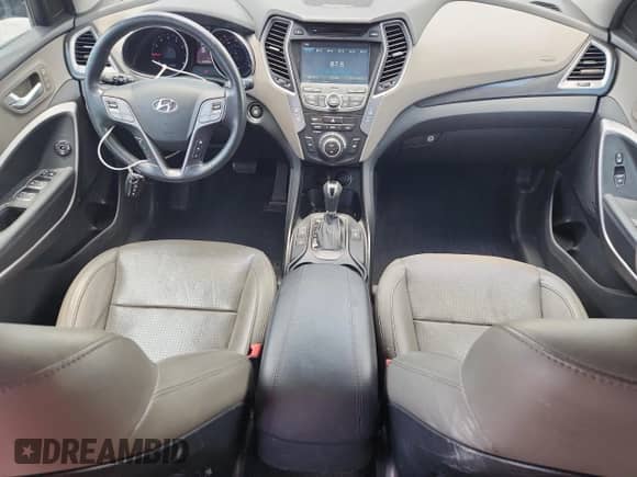 2015 Hyundai Santa Fe z VIN 5XYZUDLB1FG294690, wystawiony jako Copart lot #65039015 z przebiegiem 144 835 mil mil oraz Szkoda całkowita • Salvage title. Historia ofert i sprzedaży dostępna na DreamBid. Obrazek 8.