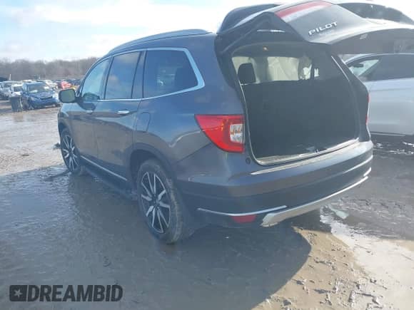 2022 Honda Pilot Elite z VIN 5FNYF6H0XNB014165, wystawiony jako IAAI lot #41196850 z przebiegiem 107 032 mil mil oraz . Historia ofert i sprzedaży dostępna na DreamBid. Obrazek 3.