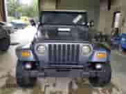2001 Jeep Wrangler SE with VIN 1J4FA29P11P358326, listed as a Copart auction lot 56181715 with 201,929 mi miles and Clean title. Bid and sale history available at DreamBid. Image 5.