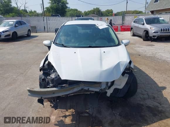 2019 Ford Fiesta S z VIN 3FADP4AJ7KM110741, wystawiony jako IAAI lot #43242052 z przebiegiem 79 046 mil mil oraz . Historia ofert i sprzedaży dostępna na DreamBid. Obrazek 13.