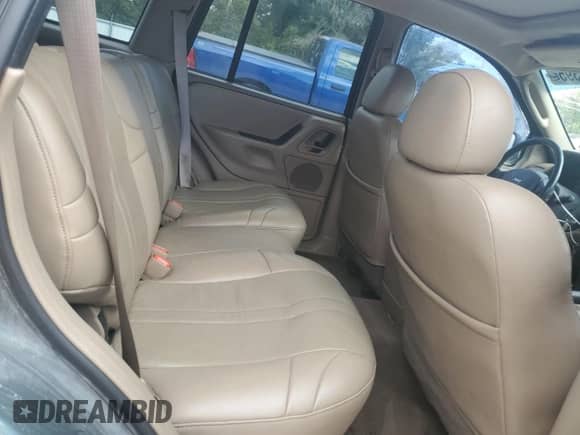 2004 Jeep Grand Cherokee Laredo with VIN 1J4GX48S24C314691, listed as a Copart auction lot 85491395 with 239,637 mi miles and Salvage title. Bid and sale history available at DreamBid. Image 11.