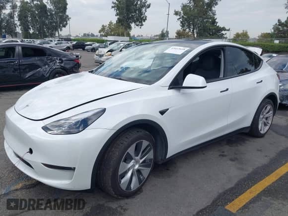 2023 Tesla Model Y Long Range with VIN 7SAYGAEE2PF763662, listed as a IAAI auction lot 43412618 with 43,857 mi miles and . Bid and sale history available at DreamBid. Image 20.