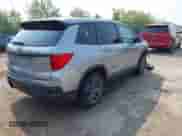 2023 Honda Passport EX-L with VIN 5FNYF8H50PB019594, listed as a IAAI auction lot 42882366 with 26,120 mi miles and . Bid and sale history available at DreamBid. Image 4.