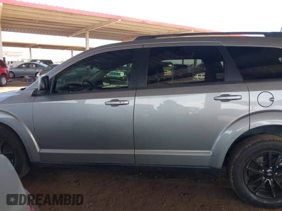 2020 Dodge Journey SE Value with VIN 3C4PDCAB3LT232412, listed as a IAAI auction lot 43155162 with 58,779 mi miles and . Bid and sale history available at DreamBid. Image 14.