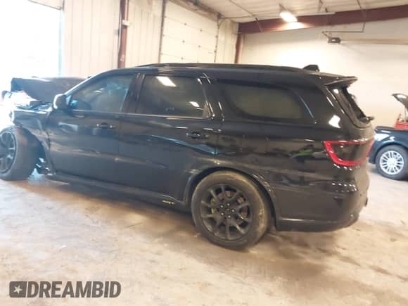 2023 Dodge Durango SRT 392 z VIN 1C4SDJGJ2PC551377, wystawiony jako IAAI lot #43135650 z przebiegiem Nie podano mil oraz . Historia ofert i sprzedaży dostępna na DreamBid. Obrazek 3.